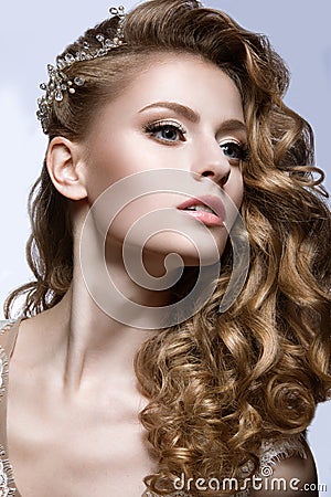 Beautiful girl in wedding image with barrette in her hair Stock Photo