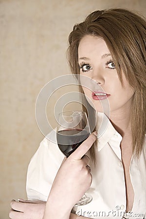 Beautiful girl in white shirt with red wine Stock Photo