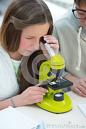 Beautiful girl working at biology classroom Stock Photo