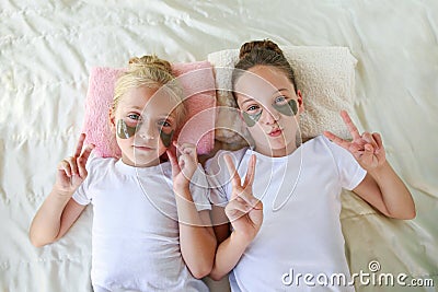 Beautiful girls with hydrogel patches under the eyes Stock Photo