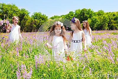 Beautiful girls in white dresses Stock Photo