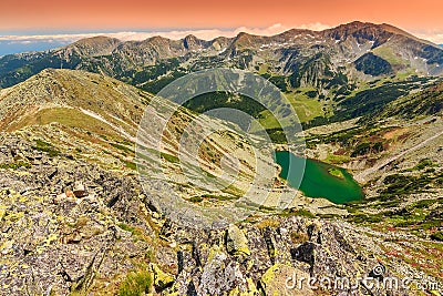 Beautiful glacier lake in high mountains,Taul Tapului Lake,Retezat mountains,Romania Stock Photo