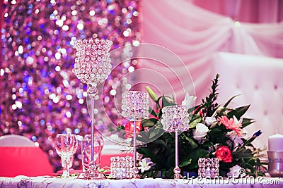 Beautiful glasses on banquet table. Decorated glasses. Stock Photo