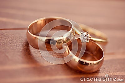 Beautiful golden engagement and wedding rings Stock Photo