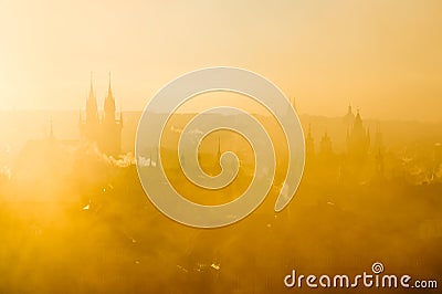 Beautiful golden scenery of soft Prague morning misty cityscape Stock Photo