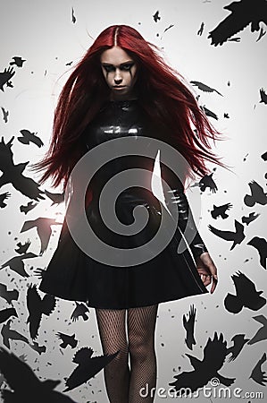 Beautiful goth mistress evil girl Stock Photo