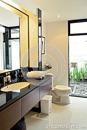 Beautiful grey new modern bathroom interior. Stock Photo