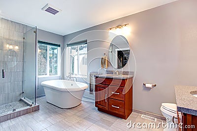 Beautiful grey new modern bathroom interior. Stock Photo