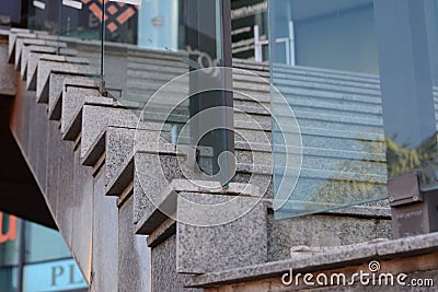 Beautiful grey stairs with tempered glass outdoors Stock Photo