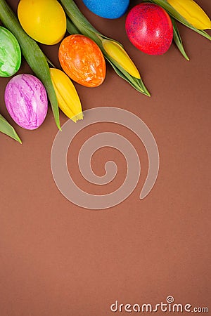 Beautiful group Easter eggs in the spring of easter day, red eggs, blue, purple and yellow on the brown background Stock Photo