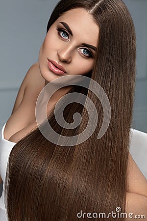 Beautiful Hair. Woman Model With Glossy Straight Long Hair. Stock Photo