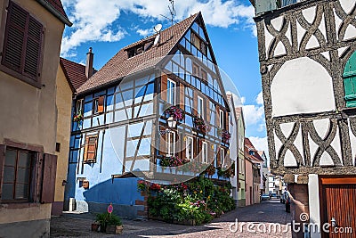 Beautiful half-timbered houses with red tiled roofs in Selestat Stock Photo