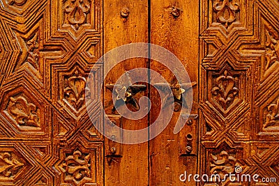 Beautiful hand carved wooden door in Morocco Stock Photo