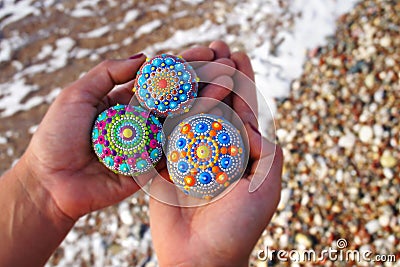 Beautiful hand painted mandala rocks Stock Photo