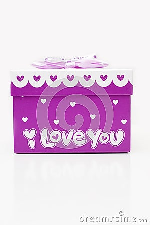 Beautiful hand-purple gift box in white background Stock Photo