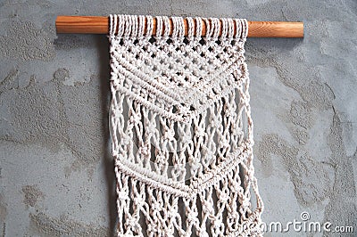 Beautiful handmade cotton macrame wall decoration Stock Photo