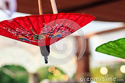 Beautiful handmade umbrellas for sale in the local market at nor Stock Photo