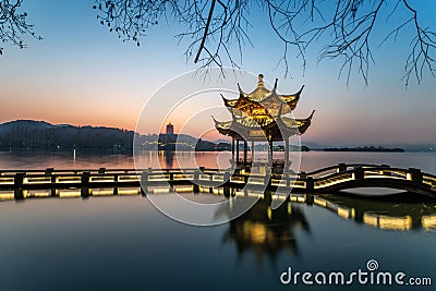 Beautiful hangzhou in sunset and ancient pavilion Stock Photo