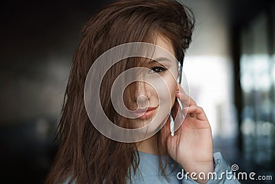 Beautiful happy brunette woman smiling on the street Stock Photo