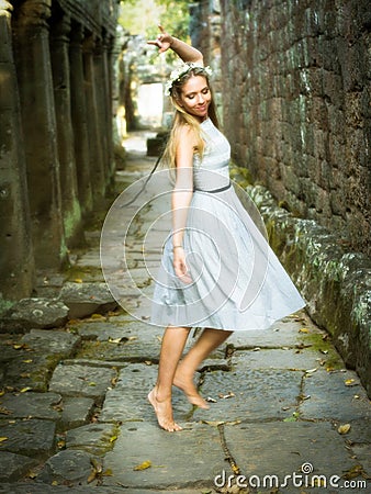 Beautiful, Happy Caucasian Woman Dancing Barefoot in Magical Fairytale Satting Stock Photo