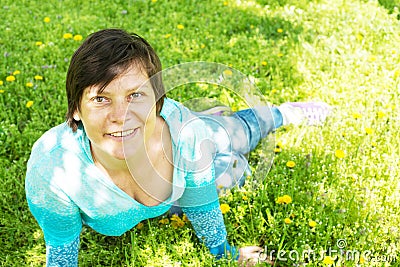 Beautiful happy woman resting in the park, relaxing and having f Stock Photo