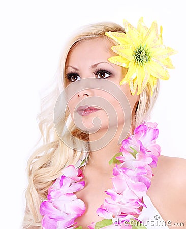 Beautiful Hawaiian girl with yellow flower on hair Stock Photo