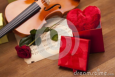 Beautiful heart in box, rose and violin! Stock Photo