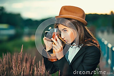 Beautiful hipster girl shooting Stock Photo