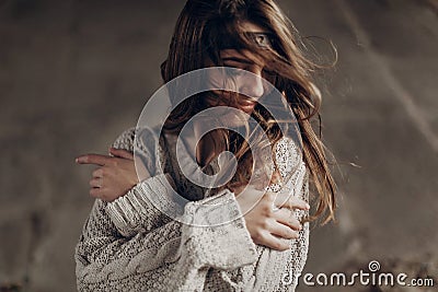 Beautiful hipster woman in boho indie clothes, posing in winter Stock Photo