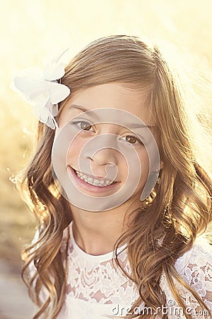 Beautiful hispanic little girl backlit portrait Stock Photo