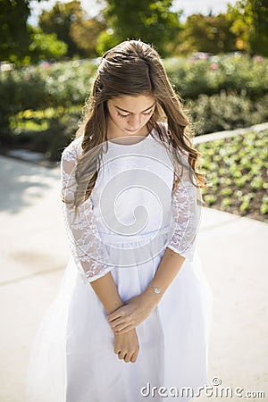 Beautiful hispanic little girl in a formal dress Stock Photo