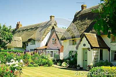 Beautiful historic thatched cottages. Editorial Stock Photo