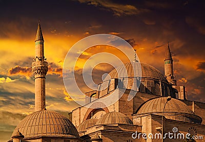 Beautiful historical Sultan Selim Camii in front of dramatic sunset in Konya Stock Photo