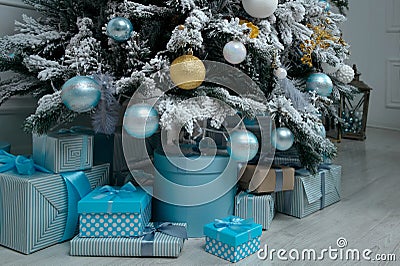 Beautiful holiday decorated room with Christmas tree with presents under it Stock Photo