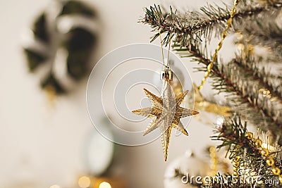 Beautiful holiday decorated room with Christmas tree with presents under it Stock Photo