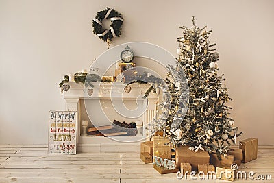 Beautiful holiday decorated room with Christmas tree with presents under it Stock Photo