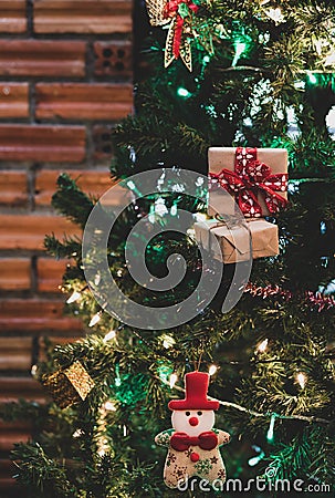 Beautiful home decorated christmas tree with Sata,baubles and gi Stock Photo