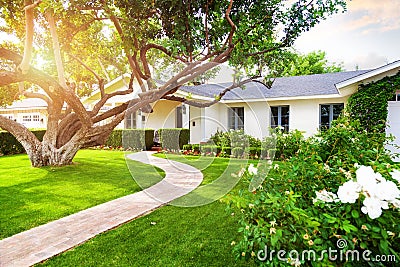 Beautiful Home With Green Grass Yard Stock Photo