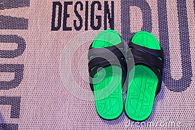 Beautiful home slippers on a jute carpet. Great screensaver for your desktop. Stock Photo