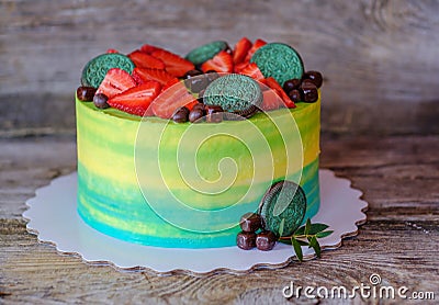 Beautiful homemade cake with yellow and green cream Stock Photo