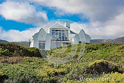 House in Cape Dutch style architecture at the South Coast in South Africa, near Hawston Editorial Stock Photo