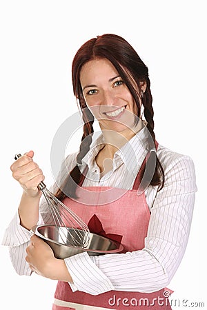 Beautiful housewife preparing with egg beater Stock Photo