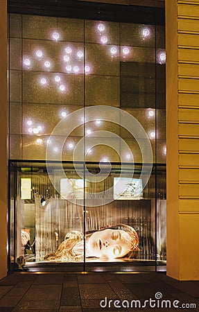 Beautiful human head sculpture display at Swarovski store in Vienna Editorial Stock Photo