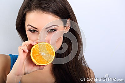 Beautiful humor emotional brunette woman with healthy skin hold Stock Photo