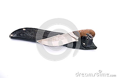 Beautiful hunting knife in a cover engraved Stock Photo