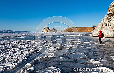 Beautiful ice surface texture in front of Shaman rock,Baikal Stock Photo