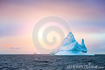 Beautiful iceberg in Ilulissat icefjord at sunset, Greenland Stock Photo