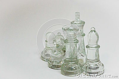 Dramatic, Chess pieces on a white Background Stock Photo