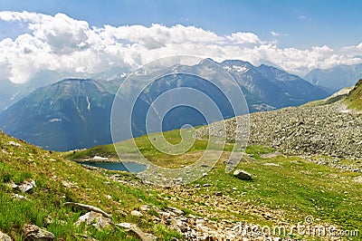 Beautiful idyllic Alps landscape with lake and mountains in summer Stock Photo