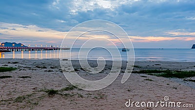 Beautiful illuminated shining in twilight at Prachuap port Stock Photo